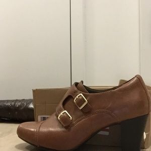 dark tan color more orangey but are are like new